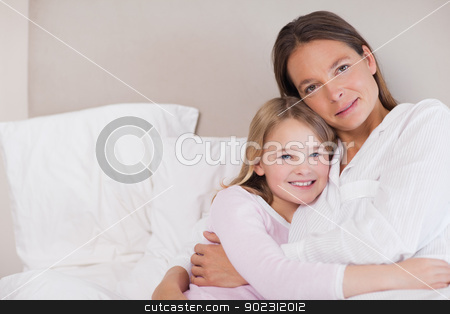 To use this stock image in your creative project, please select the size you need over to the right and click the "Add to Cart" button.
Your downloaded image will come with the Cutcaster watermark removed so don’t worry about the watermark you see on this page. Mother and her daughter hugging stock photo, Mother and her daughter hugging in a bedroom by Wavebreak Media
