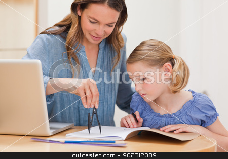 To use this stock image in your creative project, please select the size you need over to the right and click the "Add to Cart" button.
Your downloaded image will come with the Cutcaster watermark removed so don’t worry about the watermark you see on this page. Mother helping her daughter doing her homework stock photo, Mother helping her daughter doing her homework in a kitchen by Wavebreak Media