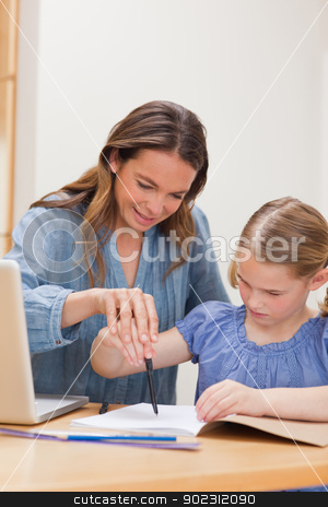 To use this stock image in your creative project, please select the size you need over to the right and click the "Add to Cart" button.
Your downloaded image will come with the Cutcaster watermark removed so don’t worry about the watermark you see on this page. Portrait of a mother helping her daughter doing her homework stock photo, Portrait of a mother helping her daughter doing her homework in a kitchen by Wavebreak Media