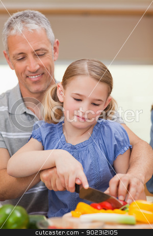 To use this stock image in your creative project, please select the size you need over to the right and click the "Add to Cart" button.
Your downloaded image will come with the Cutcaster watermark removed so don’t worry about the watermark you see on this page. Portrait of a father showing his daughter how to cook stock photo, Portrait of a father showing his daughter how to cook in a kitchen by Wavebreak Media