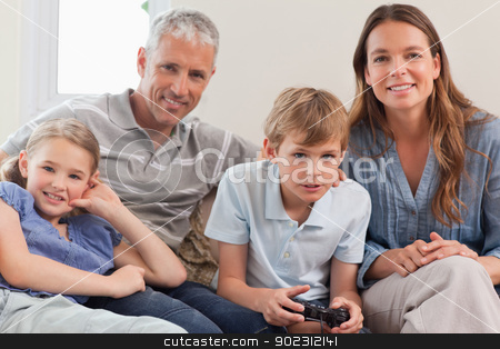 To use this stock image in your creative project, please select the size you need over to the right and click the "Add to Cart" button.
Your downloaded image will come with the Cutcaster watermark removed so don’t worry about the watermark you see on this page. Family playing video games stock photo, Family playing video games in living room by Wavebreak Media