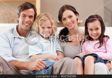 To use this stock image in your creative project, please select the size you need over to the right and click the "Add to Cart" button.
Your downloaded image will come with the Cutcaster watermark removed so don’t worry about the watermark you see on this page. Happy family watching television together stock photo, Happy family watching television together in a living room by Wavebreak Media