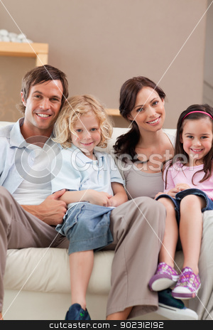 To use this stock image in your creative project, please select the size you need over to the right and click the "Add to Cart" button.
Your downloaded image will come with the Cutcaster watermark removed so don’t worry about the watermark you see on this page. Portrait of a family watching television together stock photo, Portrait of a family watching television together in a living room by Wavebreak Media