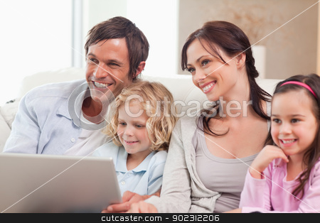 To use this stock image in your creative project, please select the size you need over to the right and click the "Add to Cart" button.
Your downloaded image will come with the Cutcaster watermark removed so don’t worry about the watermark you see on this page. Delighted family using a notebook stock photo, Delighted family using a notebook in a living room by Wavebreak Media