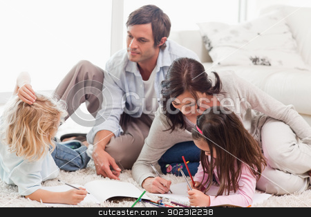 To use this stock image in your creative project, please select the size you need over to the right and click the "Add to Cart" button.
Your downloaded image will come with the Cutcaster watermark removed so don’t worry about the watermark you see on this page. Family drawing together stock photo, Family drawing together in a living room by Wavebreak Media