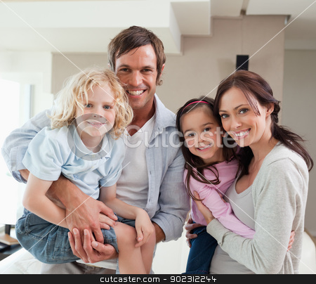 To use this stock image in your creative project, please select the size you need over to the right and click the "Add to Cart" button.
Your downloaded image will come with the Cutcaster watermark removed so don’t worry about the watermark you see on this page. Charming family posing together stock photo, Charming family posing together in a living room by Wavebreak Media