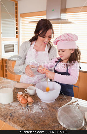 To use this stock image in your creative project, please select the size you need over to the right and click the "Add to Cart" button.
Your downloaded image will come with the Cutcaster watermark removed so don’t worry about the watermark you see on this page. Portrait of a mother and her happy daughter baking stock photo, Portrait of a mother and her happy daughter baking in a kitchen by Wavebreak Media