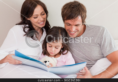 To use this stock image in your creative project, please select the size you need over to the right and click the "Add to Cart" button.
Your downloaded image will come with the Cutcaster watermark removed so don’t worry about the watermark you see on this page. Happy parents reading a story to their daughter stock photo, Happy parents reading a story to their daughter in a bedroom by Wavebreak Media