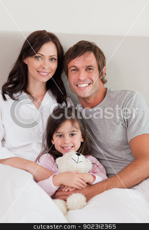 To use this stock image in your creative project, please select the size you need over to the right and click the "Add to Cart" button.
Your downloaded image will come with the Cutcaster watermark removed so don’t worry about the watermark you see on this page. Portrait of parents posing with their daughter stock photo, Portrait of parents posing with their daughter in their bedroom by Wavebreak Media