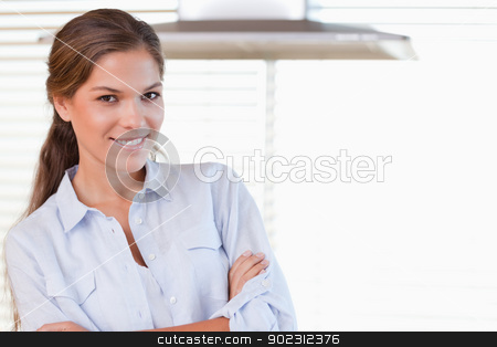 To use this stock image in your creative project, please select the size you need over to the right and click the "Add to Cart" button.
Your downloaded image will come with the Cutcaster watermark removed so don’t worry about the watermark you see on this page. Smiling woman posing stock photo, Smiling woman posing in her kitchen by Wavebreak Media