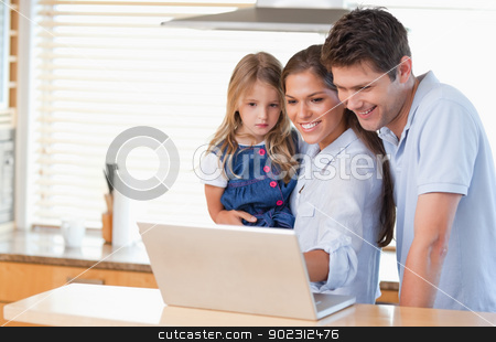To use this stock image in your creative project, please select the size you need over to the right and click the "Add to Cart" button.
Your downloaded image will come with the Cutcaster watermark removed so don’t worry about the watermark you see on this page. Family using a laptop stock photo, Family using a laptop in a kitchen by Wavebreak Media