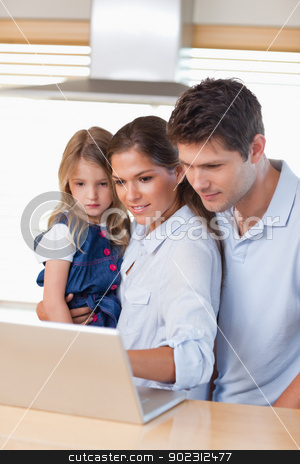 To use this stock image in your creative project, please select the size you need over to the right and click the "Add to Cart" button.
Your downloaded image will come with the Cutcaster watermark removed so don’t worry about the watermark you see on this page. Portrait of a family using a laptop stock photo, Portrait of a family using a laptop in their kitchen by Wavebreak Media