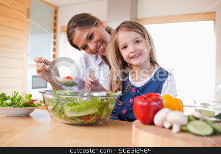 To use this stock image in your creative project, please select the size you need over to the right and click the "Add to Cart" button.
Your downloaded image will come with the Cutcaster watermark removed so don’t worry about the watermark you see on this page. Happy mother and her daughter preparing a salad stock photo, Happy mother and her daughter preparing a salad in their kitchen by Wavebreak Media