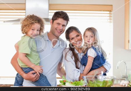 To use this stock image in your creative project, please select the size you need over to the right and click the "Add to Cart" button.
Your downloaded image will come with the Cutcaster watermark removed so don’t worry about the watermark you see on this page. Happy family posing stock photo, Happy family posing in their kitchen by Wavebreak Media