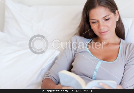 To use this stock image in your creative project, please select the size you need over to the right and click the "Add to Cart" button.
Your downloaded image will come with the Cutcaster watermark removed so don’t worry about the watermark you see on this page. Woman reading a book stock photo, Woman reading a book in her bedroom by Wavebreak Media