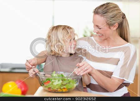 To use this stock image in your creative project, please select the size you need over to the right and click the "Add to Cart" button.
Your downloaded image will come with the Cutcaster watermark removed so don’t worry about the watermark you see on this page. Happy mother and son preparing salad stock photo, Happy mother and son preparing salad together by Wavebreak Media
