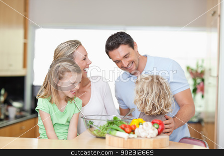 To use this stock image in your creative project, please select the size you need over to the right and click the "Add to Cart" button.
Your downloaded image will come with the Cutcaster watermark removed so don’t worry about the watermark you see on this page. Happy family in the kitchen stock photo, Happy family together in the kitchen by Wavebreak Media