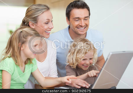 To use this stock image in your creative project, please select the size you need over to the right and click the "Add to Cart" button.
Your downloaded image will come with the Cutcaster watermark removed so don’t worry about the watermark you see on this page. Family surfing the web stock photo, Family surfing the web together by Wavebreak Media