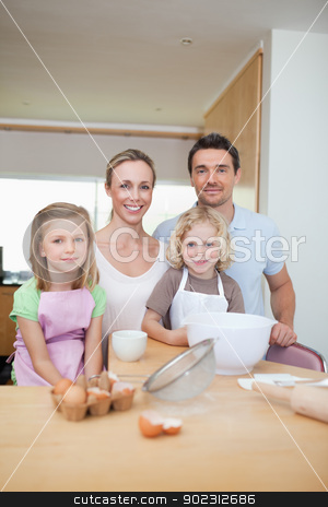 To use this stock image in your creative project, please select the size you need over to the right and click the "Add to Cart" button.
Your downloaded image will come with the Cutcaster watermark removed so don’t worry about the watermark you see on this page. Happy smiling family preparing cookies stock photo, Happy smiling family preparing cookies together by Wavebreak Media