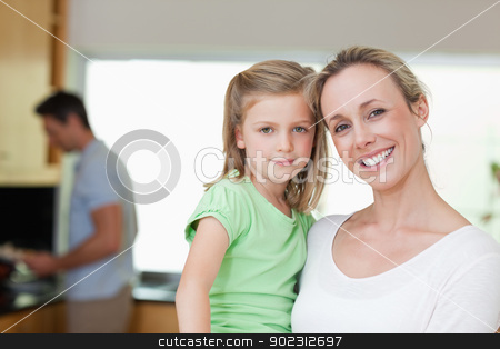 To use this stock image in your creative project, please select the size you need over to the right and click the "Add to Cart" button.
Your downloaded image will come with the Cutcaster watermark removed so don’t worry about the watermark you see on this page. Mother and daughter with father in the background stock photo, Mother and daughter together with father in the background by Wavebreak Media