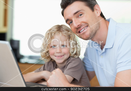 To use this stock image in your creative project, please select the size you need over to the right and click the "Add to Cart" button.
Your downloaded image will come with the Cutcaster watermark removed so don’t worry about the watermark you see on this page. Smiling father and son with notebook stock photo, Smiling father and son together with notebook by Wavebreak Media