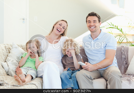 To use this stock image in your creative project, please select the size you need over to the right and click the "Add to Cart" button.
Your downloaded image will come with the Cutcaster watermark removed so don’t worry about the watermark you see on this page. Family laughing on the sofa stock photo, Family laughing on the sofa together by Wavebreak Media