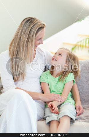 To use this stock image in your creative project, please select the size you need over to the right and click the "Add to Cart" button.
Your downloaded image will come with the Cutcaster watermark removed so don’t worry about the watermark you see on this page. Mother and daughter sitting on couch stock photo, Mother and daughter sitting on the couch by Wavebreak Media