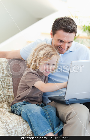 To use this stock image in your creative project, please select the size you need over to the right and click the "Add to Cart" button.
Your downloaded image will come with the Cutcaster watermark removed so don’t worry about the watermark you see on this page. Father and son with notebook on sofa stock photo, Father and son together with notebook on sofa by Wavebreak Media