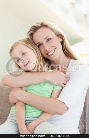 To use this stock image in your creative project, please select the size you need over to the right and click the "Add to Cart" button.
Your downloaded image will come with the Cutcaster watermark removed so don’t worry about the watermark you see on this page. Mother embracing daughter on sofa stock photo, Mother embracing daughter on the sofa by Wavebreak Media
