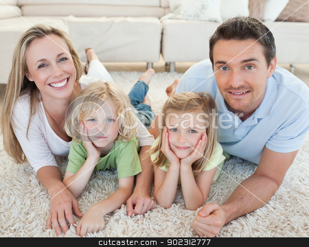 To use this stock image in your creative project, please select the size you need over to the right and click the "Add to Cart" button.
Your downloaded image will come with the Cutcaster watermark removed so don’t worry about the watermark you see on this page. Family lying on the carpet stock photo, Family lying on the carpet together by Wavebreak Media