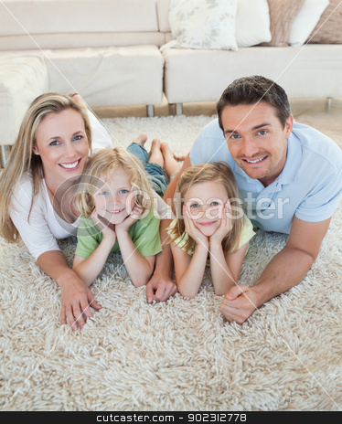 To use this stock image in your creative project, please select the size you need over to the right and click the "Add to Cart" button.
Your downloaded image will come with the Cutcaster watermark removed so don’t worry about the watermark you see on this page. Happy family on the floor stock photo, Happy family together on the floor by Wavebreak Media