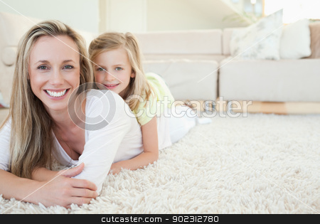 To use this stock image in your creative project, please select the size you need over to the right and click the "Add to Cart" button.
Your downloaded image will come with the Cutcaster watermark removed so don’t worry about the watermark you see on this page. Mother and daughter lying on the floor stock photo, Mother and daughter lying on the floor together by Wavebreak Media
