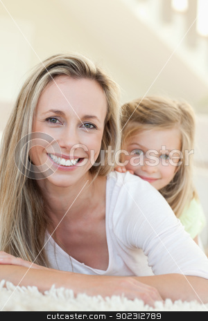 To use this stock image in your creative project, please select the size you need over to the right and click the "Add to Cart" button.
Your downloaded image will come with the Cutcaster watermark removed so don’t worry about the watermark you see on this page. Smiling mother and daughter on the carpet stock photo, Smiling mother and daughter together on the carpet by Wavebreak Media