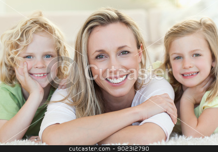To use this stock image in your creative project, please select the size you need over to the right and click the "Add to Cart" button.
Your downloaded image will come with the Cutcaster watermark removed so don’t worry about the watermark you see on this page. Mother with her children on the floor stock photo, Mother together with her children on the floor by Wavebreak Media