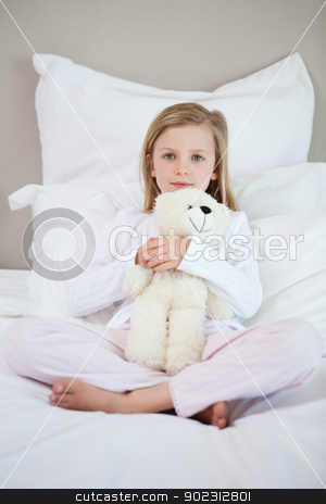 To use this stock image in your creative project, please select the size you need over to the right and click the "Add to Cart" button.
Your downloaded image will come with the Cutcaster watermark removed so don’t worry about the watermark you see on this page. Girl hugging her teddy on the bed stock photo, Little girl hugging her teddy on the bed by Wavebreak Media