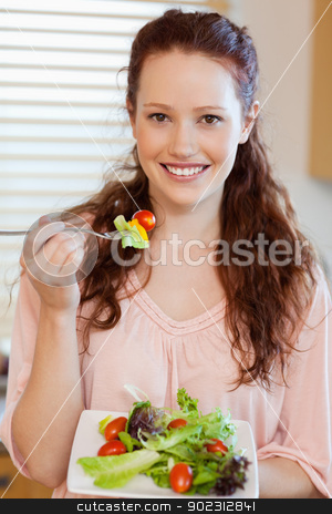 To use this stock image in your creative project, please select the size you need over to the right and click the "Add to Cart" button.
Your downloaded image will come with the Cutcaster watermark removed so don’t worry about the watermark you see on this page. Girl eating salad stock photo, Girl eating fresh salad by Wavebreak Media