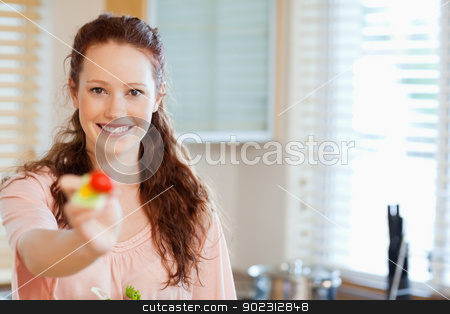 To use this stock image in your creative project, please select the size you need over to the right and click the "Add to Cart" button.
Your downloaded image will come with the Cutcaster watermark removed so don’t worry about the watermark you see on this page. Woman offering some salad stock photo, Woman offering some healthy salad by Wavebreak Media