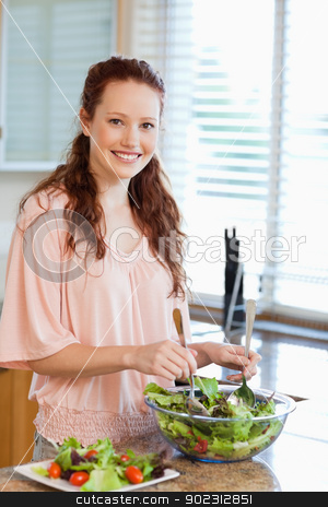 To use this stock image in your creative project, please select the size you need over to the right and click the "Add to Cart" button.
Your downloaded image will come with the Cutcaster watermark removed so don’t worry about the watermark you see on this page. Woman preparing salad stock photo, Woman preparing green salad by Wavebreak Media