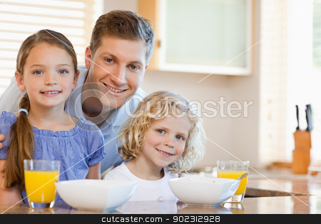 To use this stock image in your creative project, please select the size you need over to the right and click the "Add to Cart" button.
Your downloaded image will come with the Cutcaster watermark removed so don’t worry about the watermark you see on this page. Father with his children in the kitchen stock photo, Father together with his children in the kitchen by Wavebreak Media