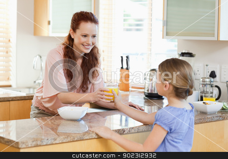 To use this stock image in your creative project, please select the size you need over to the right and click the "Add to Cart" button.
Your downloaded image will come with the Cutcaster watermark removed so don’t worry about the watermark you see on this page. Mother giving her daughter orange juice stock photo, Mother giving her daughter a glass of orange juice by Wavebreak Media