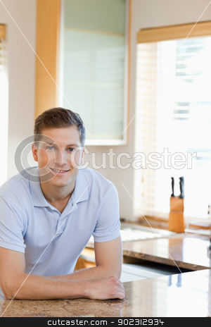 To use this stock image in your creative project, please select the size you need over to the right and click the "Add to Cart" button.
Your downloaded image will come with the Cutcaster watermark removed so don’t worry about the watermark you see on this page. Man leaning against the kitchen counter stock photo, Smiling man leaning against the kitchen counter by Wavebreak Media