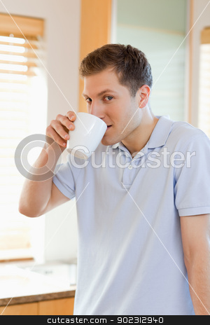 To use this stock image in your creative project, please select the size you need over to the right and click the "Add to Cart" button.
Your downloaded image will come with the Cutcaster watermark removed so don’t worry about the watermark you see on this page. Man drinking some coffee out of his cup stock photo, Man drinking some coffee out of his white cup by Wavebreak Media