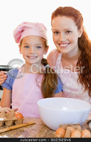 To use this stock image in your creative project, please select the size you need over to the right and click the "Add to Cart" button.
Your downloaded image will come with the Cutcaster watermark removed so don’t worry about the watermark you see on this page. Mother and daughter with ingredients for cookies stock photo, Smiling mother and daughter with ingredients for cookies by Wavebreak Media