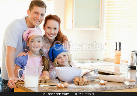 To use this stock image in your creative project, please select the size you need over to the right and click the "Add to Cart" button.
Your downloaded image will come with the Cutcaster watermark removed so don’t worry about the watermark you see on this page. Family with baking ingredients behind the kitchen counter stock photo, Family together with baking ingredients behind the kitchen counter by Wavebreak Media