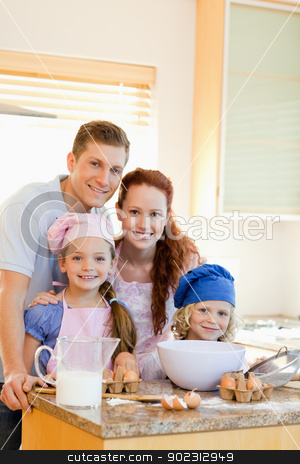 To use this stock image in your creative project, please select the size you need over to the right and click the "Add to Cart" button.
Your downloaded image will come with the Cutcaster watermark removed so don’t worry about the watermark you see on this page. Happy family with baking ingredients stock photo, Happy smiling family with baking ingredients by Wavebreak Media