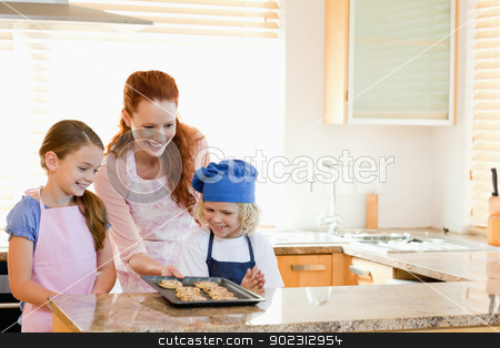 To use this stock image in your creative project, please select the size you need over to the right and click the "Add to Cart" button.
Your downloaded image will come with the Cutcaster watermark removed so don’t worry about the watermark you see on this page. Mother presenting finished cookies to her children stock photo, Smiling mother presenting finished cookies to her children by Wavebreak Media