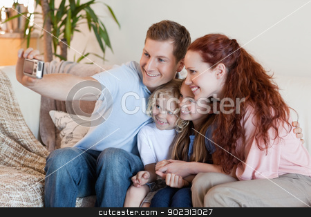 To use this stock image in your creative project, please select the size you need over to the right and click the "Add to Cart" button.
Your downloaded image will come with the Cutcaster watermark removed so don’t worry about the watermark you see on this page. Father taking family photography stock photo, Young father taking family photography by Wavebreak Media