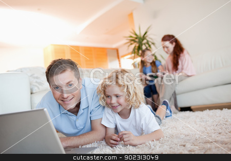 To use this stock image in your creative project, please select the size you need over to the right and click the "Add to Cart" button.
Your downloaded image will come with the Cutcaster watermark removed so don’t worry about the watermark you see on this page. Father and son using the internet stock photo, Father and son using the internet together by Wavebreak Media