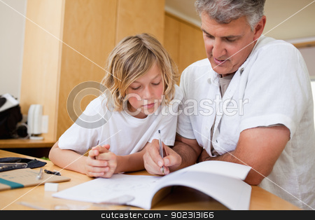 To use this stock image in your creative project, please select the size you need over to the right and click the "Add to Cart" button.
Your downloaded image will come with the Cutcaster watermark removed so don’t worry about the watermark you see on this page. Boy gets help with his homework stock photo, Boy gets help help with homework from father by Wavebreak Media