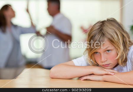 To use this stock image in your creative project, please select the size you need over to the right and click the "Add to Cart" button.
Your downloaded image will come with the Cutcaster watermark removed so don’t worry about the watermark you see on this page. Worried looking boy with fighting parents behind him stock photo, Worried looking boy with his fighting parents behind him by Wavebreak Media